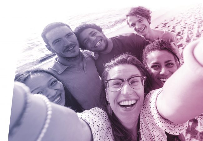 Multiracial Group of Friends Taking Selfie at Beach Multiracial Group of Friends Taking Selfie at Beach